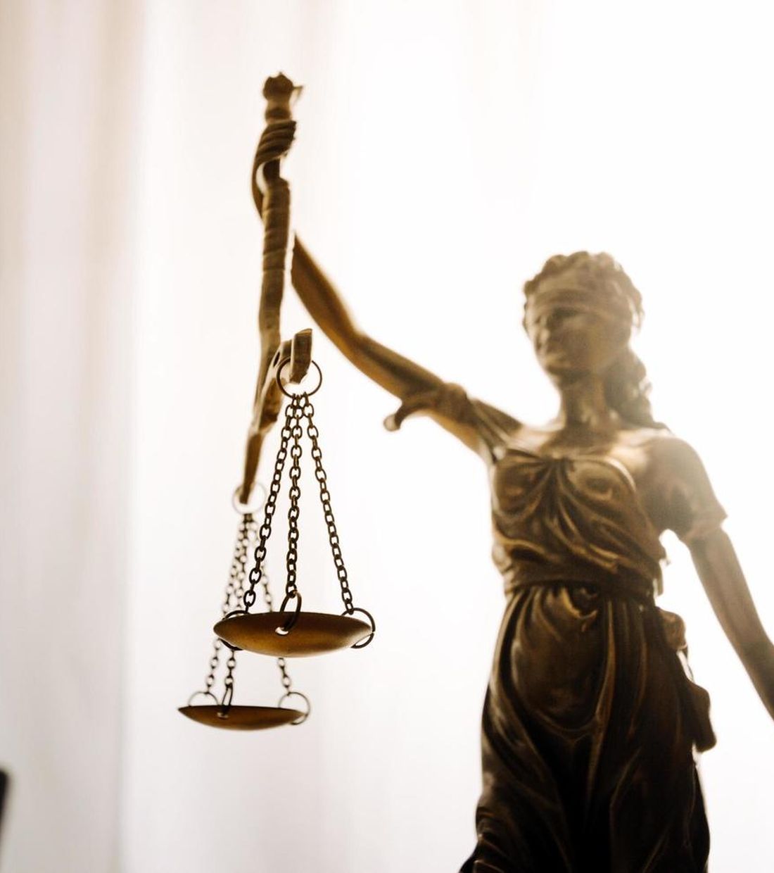 Scales of justice on an attorney's desk