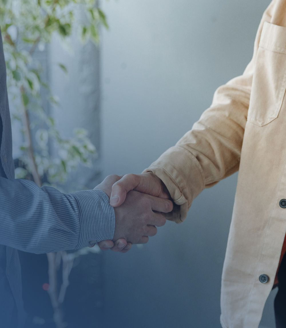 Attorney and client shaking hands