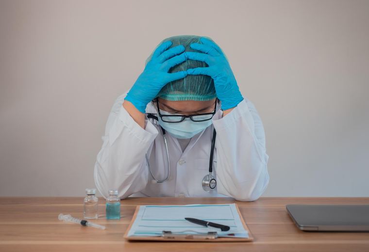 Physician after receiving difficult news